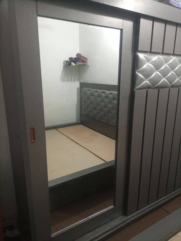 Bed with selinding wardrobe for sale without metrees 3