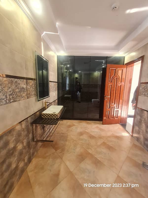 1 Kanal Brand New Super Hot Located Bungalow On Main Road With Full Basement And Home Theatre Is Available For Rent In The Best Block Of DHA Phase 6 Lahore Opposite To Lahore Garrison University 4