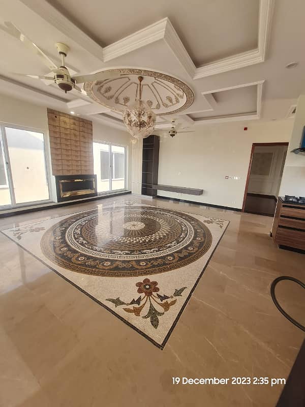 1 Kanal Brand New Super Hot Located Bungalow On Main Road With Full Basement And Home Theatre Is Available For Rent In The Best Block Of DHA Phase 6 Lahore Opposite To Lahore Garrison University 17