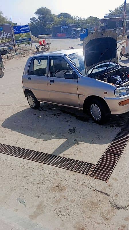 Daihatsu Cuore 2007 smart card bana he tex celar he 25tak 17