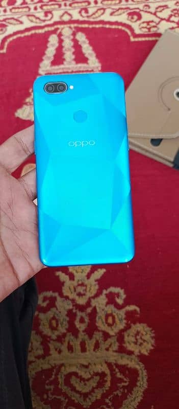 oppoA12for sale in 9 by 10 condition with original box and charger 1