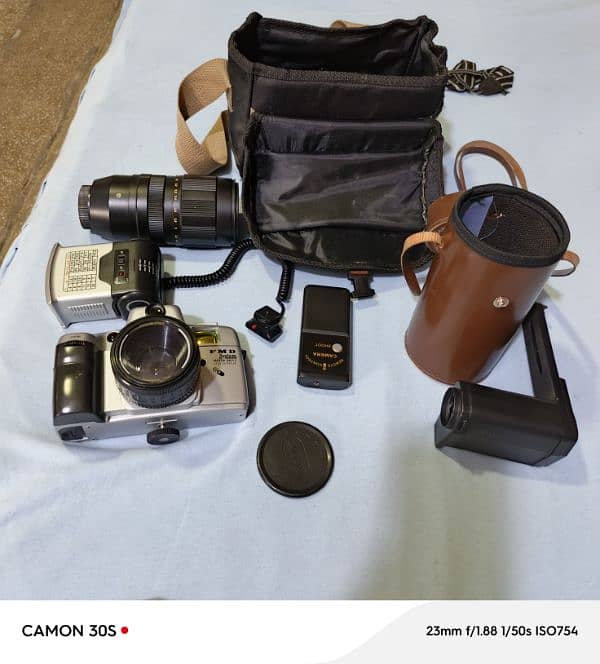 old camera with lense flash light, lense case, camera case, 5