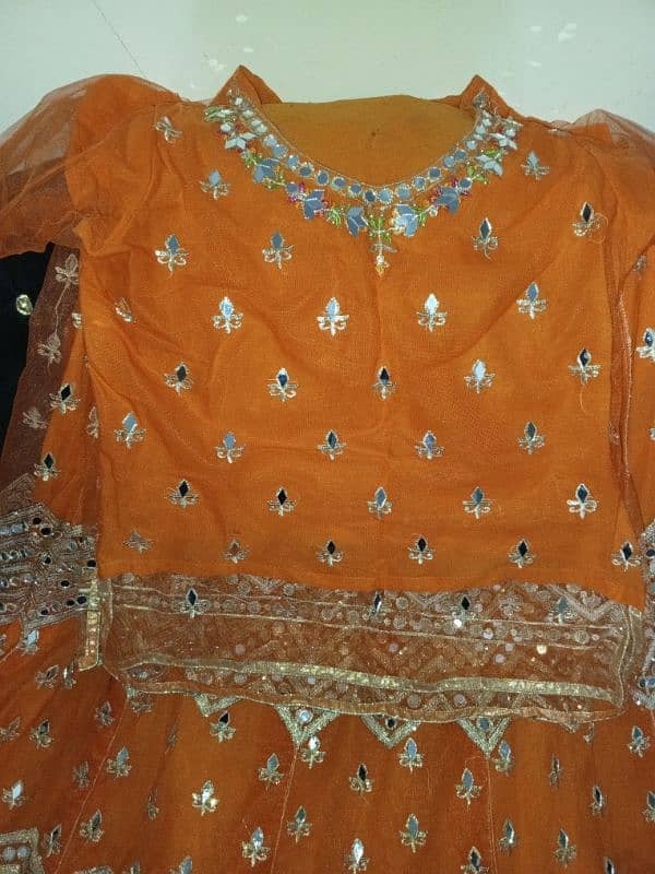 mehndi bride lehnga orange color 2