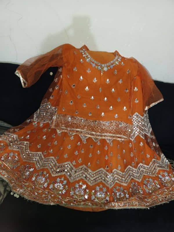 mehndi bride lehnga orange color 4