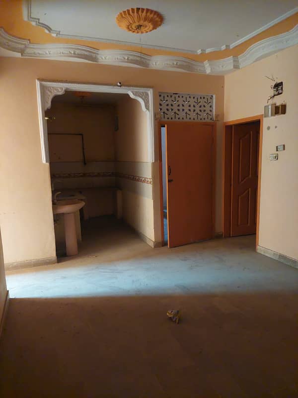 Flat for sale 100sq yard in main road Allah wala town korangi crossing 3