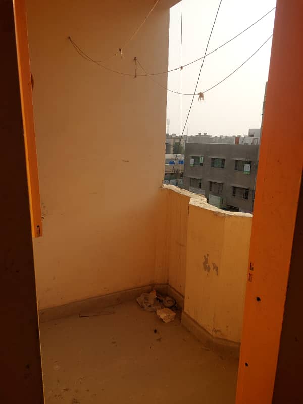 Flat for sale 100sq yard in main road Allah wala town korangi crossing 7