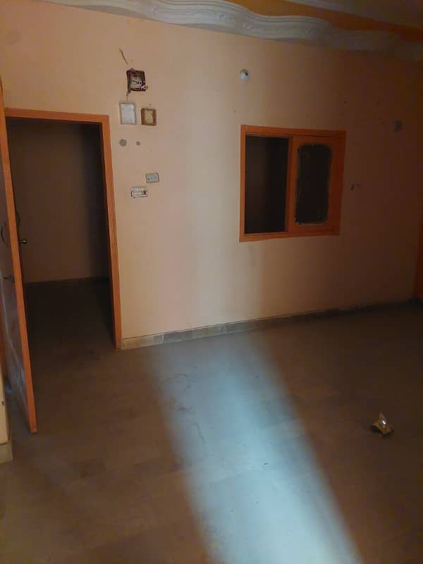 Flat for sale 100sq yard in main road Allah wala town korangi crossing 12