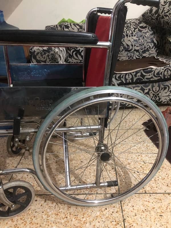 wheel chair new condition 2-3 used only 3