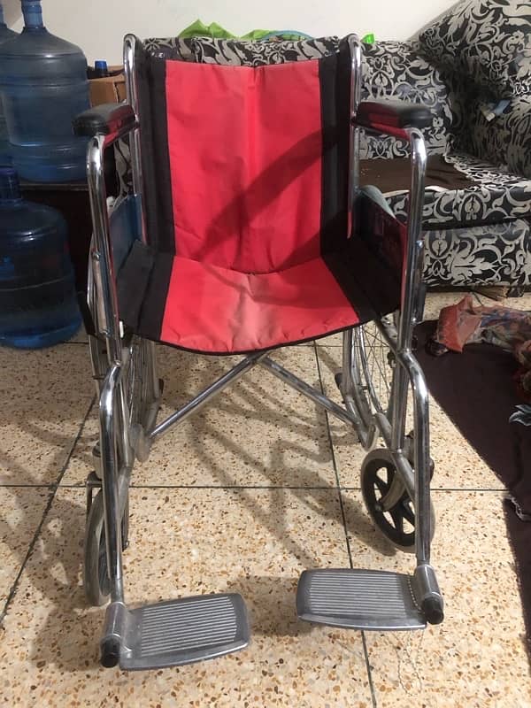 wheel chair new condition 2-3 used only 5