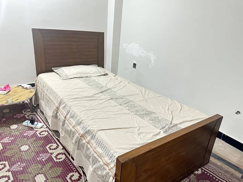 10/10 condition single woden bed for sale 0