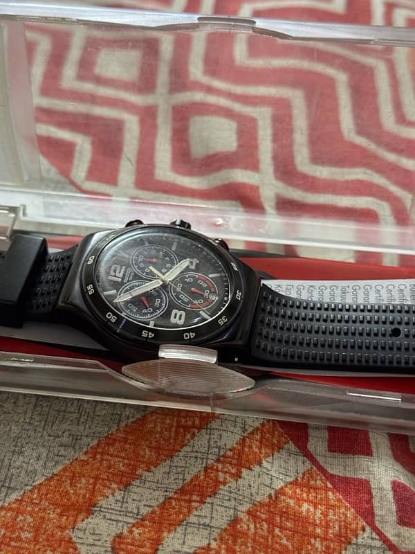 swatch watch with black strap 3