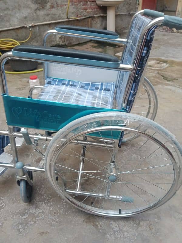 wheel chair  some days use ki bass 15500 ki li thi heavy material 1