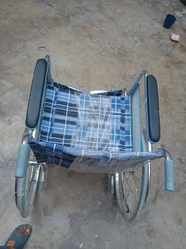 wheel chair  some days use ki bass 15500 ki li thi heavy material 3