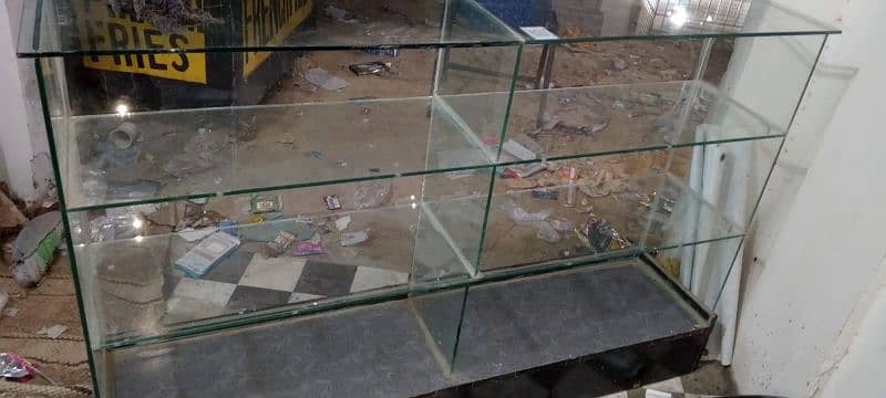 Urgent Sale One wooden 2nd glass counter for shop 2