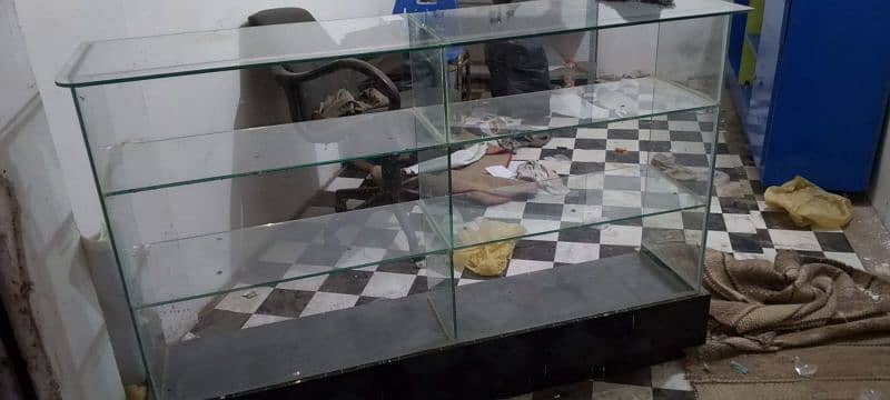 Urgent Sale One wooden 2nd glass counter for shop 3