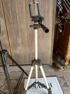 two tripods stand only few days use .