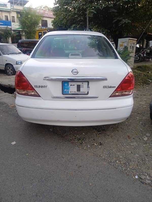 Nissan Sunny 2010 model withe color Islamabad register 1