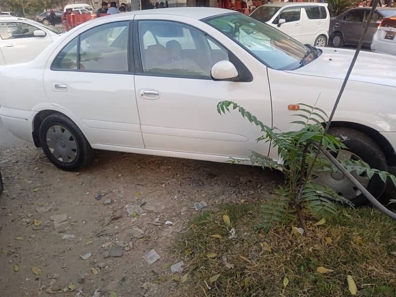 Nissan Sunny 2010 model withe color Islamabad register 3