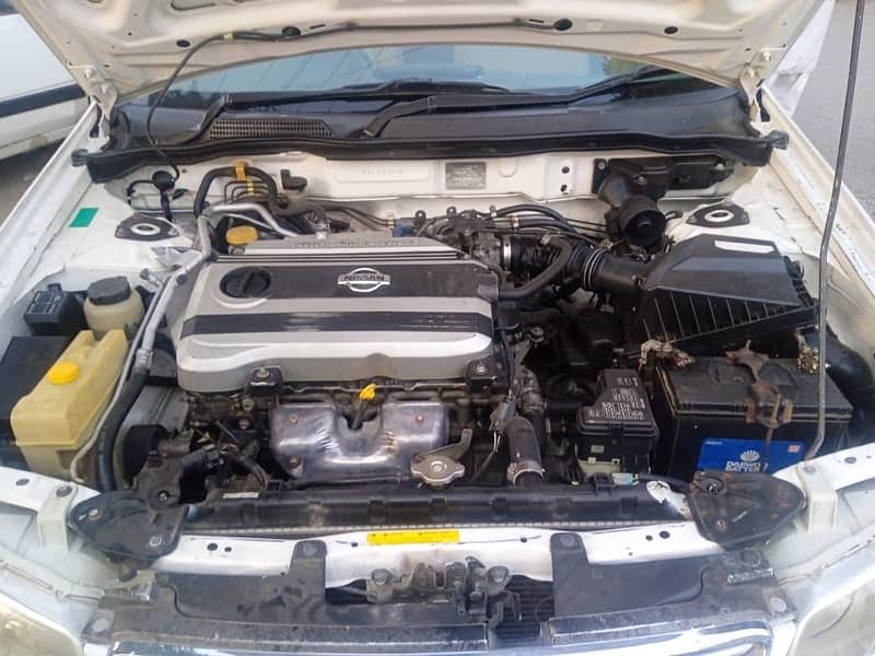 Nissan Sunny 2010 model withe color Islamabad register 6