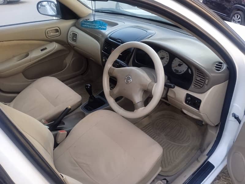 Nissan Sunny 2010 model withe color Islamabad register 7