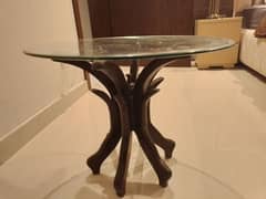 corner table with round shape glass top