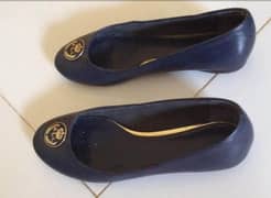 used pumps clean ladies Good condition navy blue color size 40.