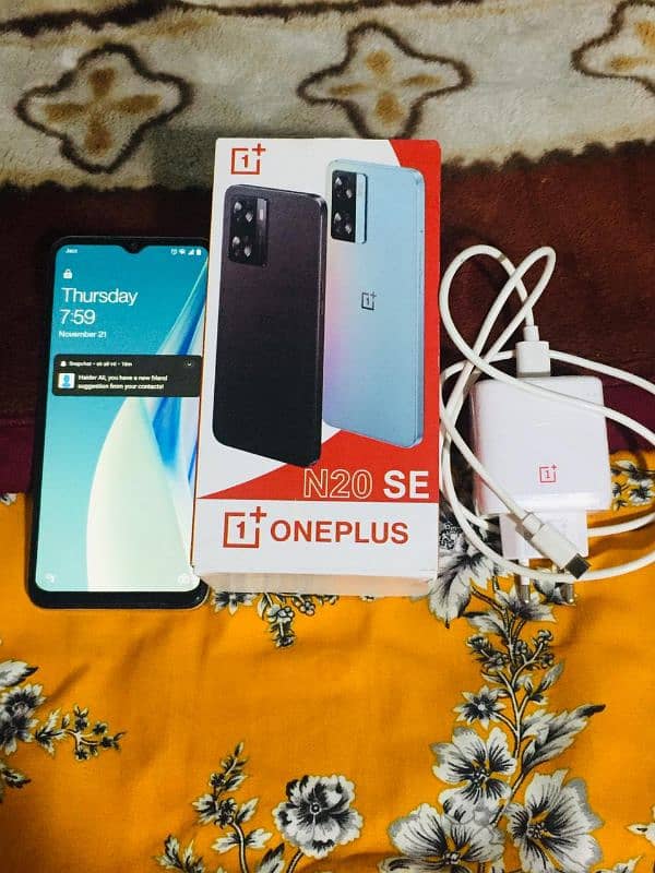 OnePlus mobile original charger ke sath saath mein box. 6 GB ,128, 5