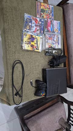 xbox 360 slim with 4 controller and all cd