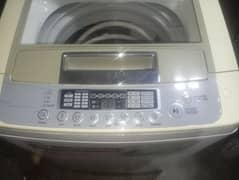 LG washing fully automatic machine 8 kg top load  turbo drum