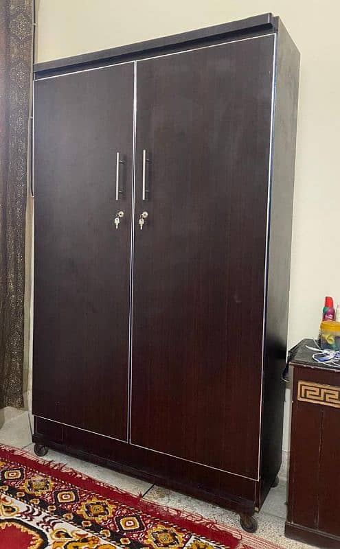 dual door cupboard/wardrobe. 1