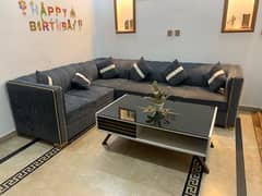 l shaped sofa 6 seater in charcoal grey colour/ sofa set with table