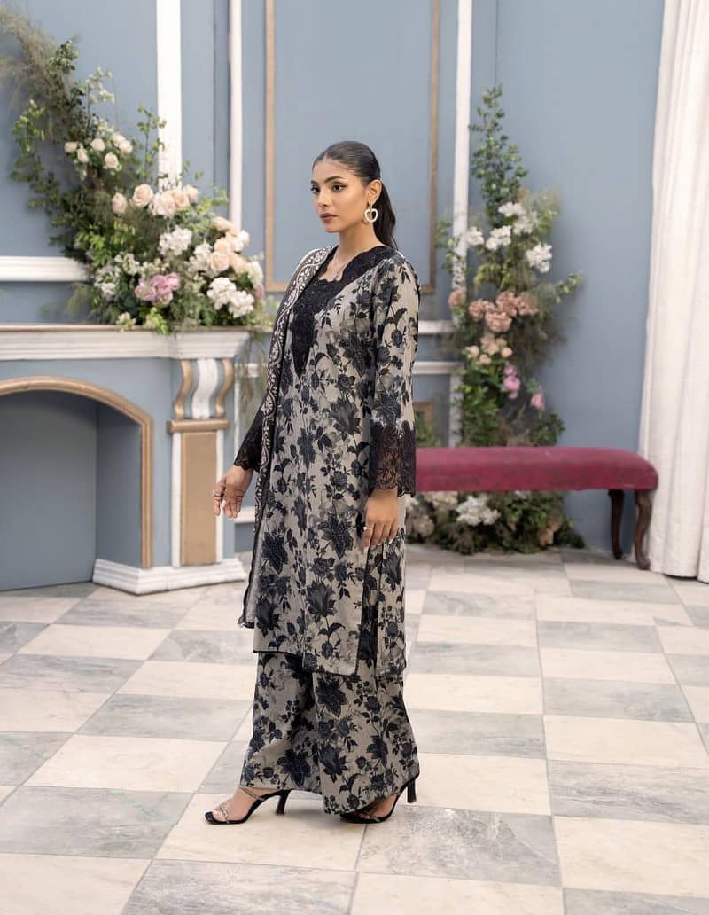 Stylish Black Printed Khaddar Suit - 2Pcs with elegant lace work 1