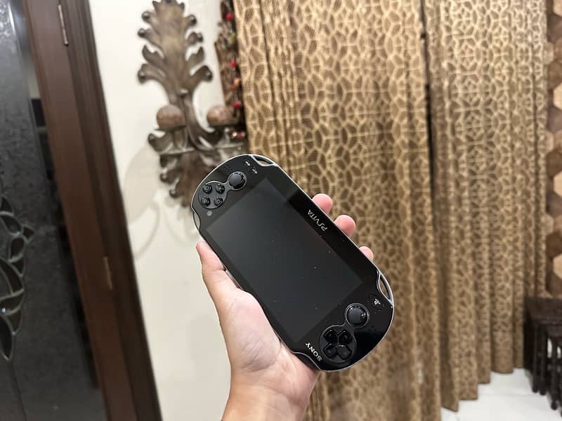 SONY PS VITA WITH PROTECTIVE CASE FOR SALE 0