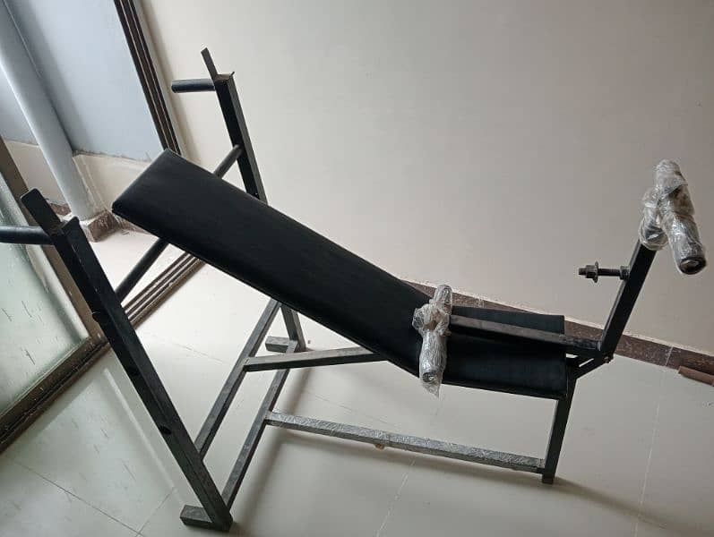 Multipurpose Bench + Weight Plates + Rod 1