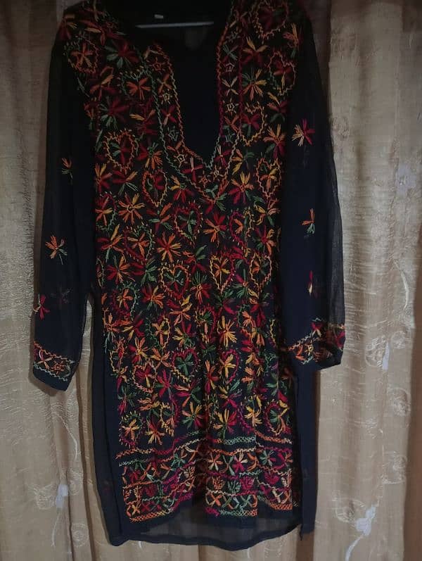 black chiffon with multi colour Sindhi work. 0