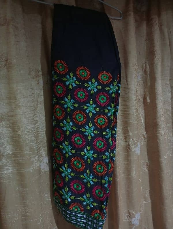 black chiffon with multi colour Sindhi work. 1