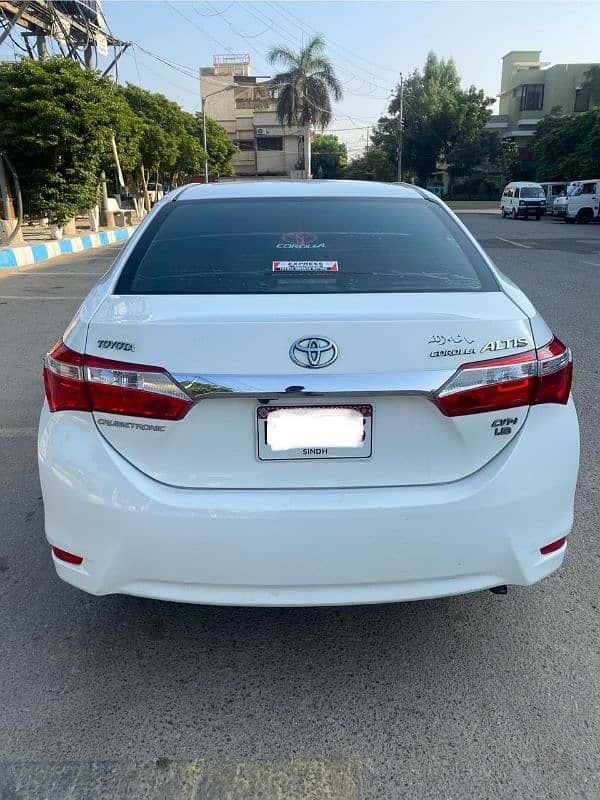 Toyota Corolla Altis 1.8 super White 5