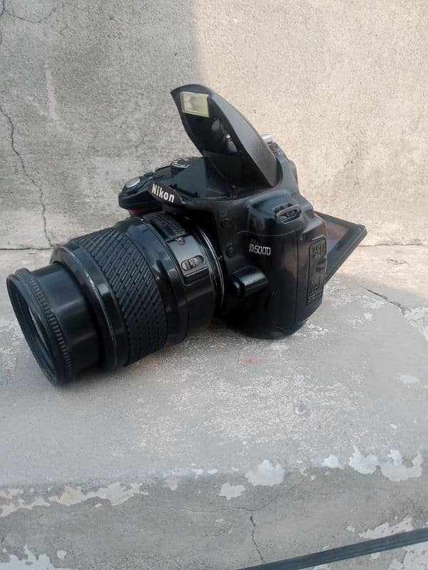 Nikon. d5000 with all assesries cash on delivery price dead final 1