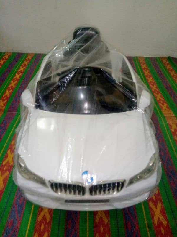 Kids Electric Car O3358O8816O Call/Whatsap. Brand New with Charger 1