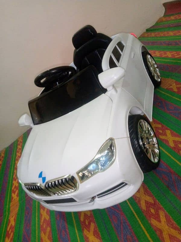 Kids Electric Car O3358O8816O Call/Whatsap. Brand New with Charger 6