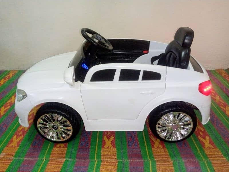 Kids Electric Car O3358O8816O Call/Whatsap. Brand New with Charger 8