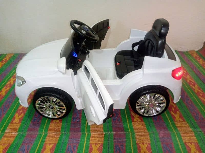 Kids Electric Car O3358O8816O Call/Whatsap. Brand New with Charger 9