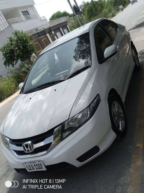 Honda City auto 1.3 brand new lahore num 7