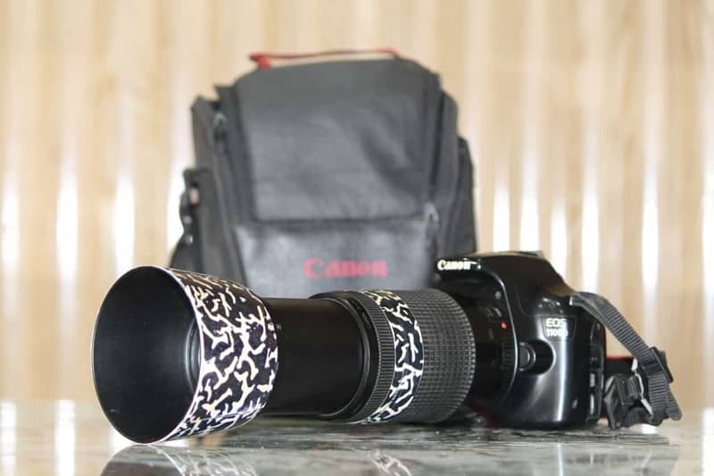 Canon 1100d with 75-300mm lens for sale 0