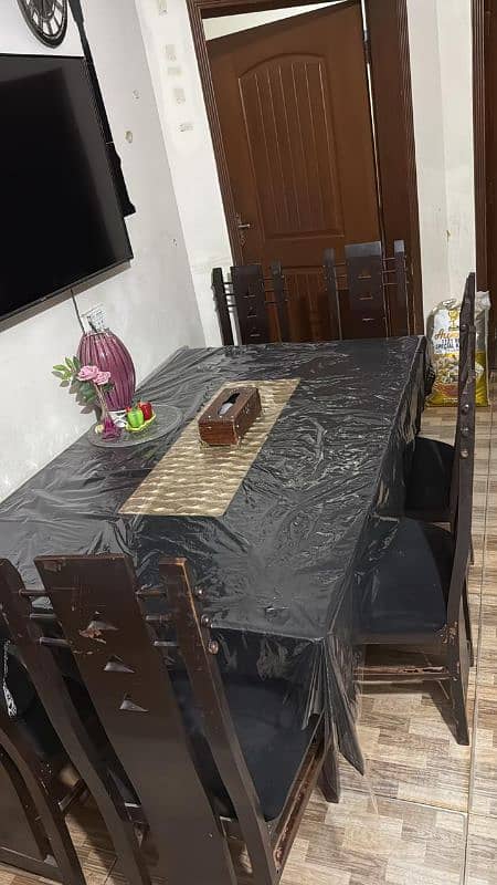 wooden 6 chair dining table in low price for sale in good condition 2