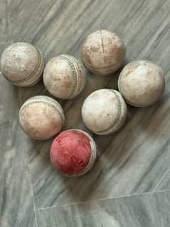 7 used cricket balls