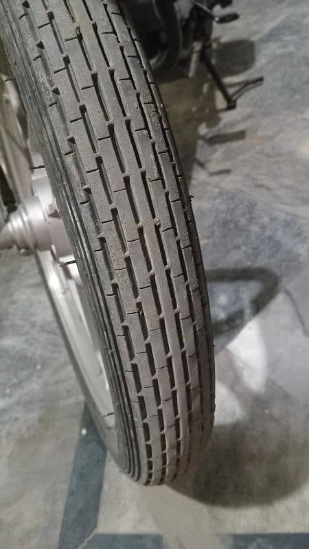 Suzuki gs150 front and rear tires 1