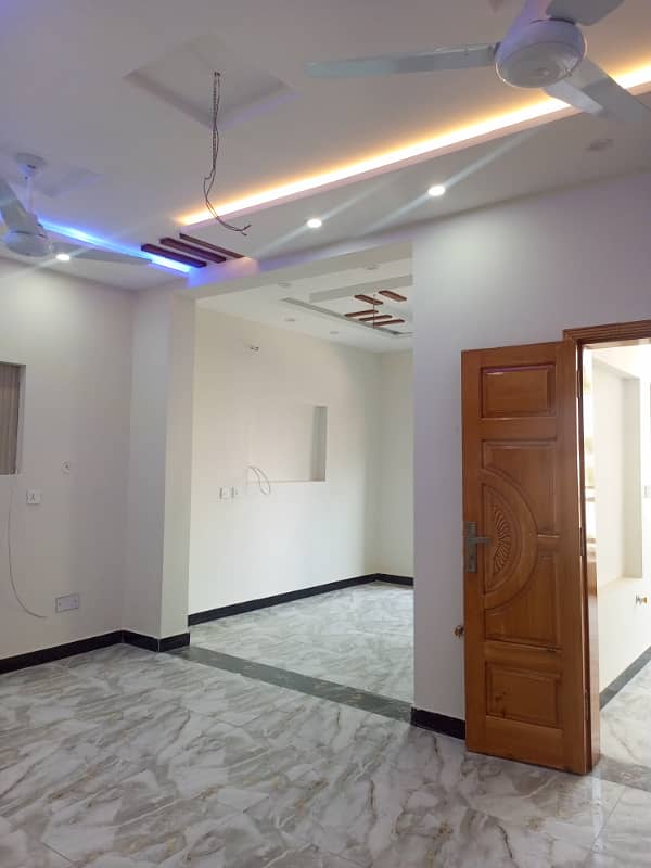 Upper portion house 1.5story available for rent location main haji cam double road. 5