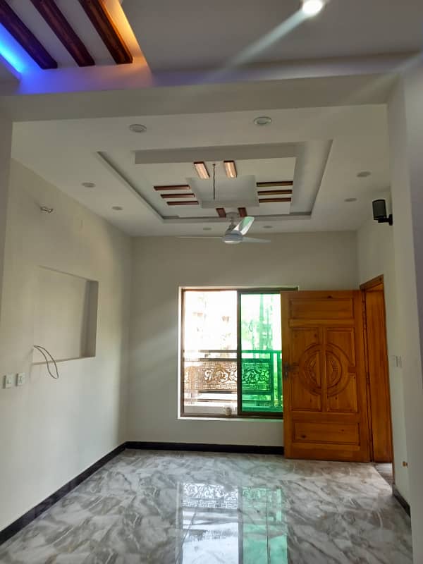 Upper portion house 1.5story available for rent location main haji cam double road. 10