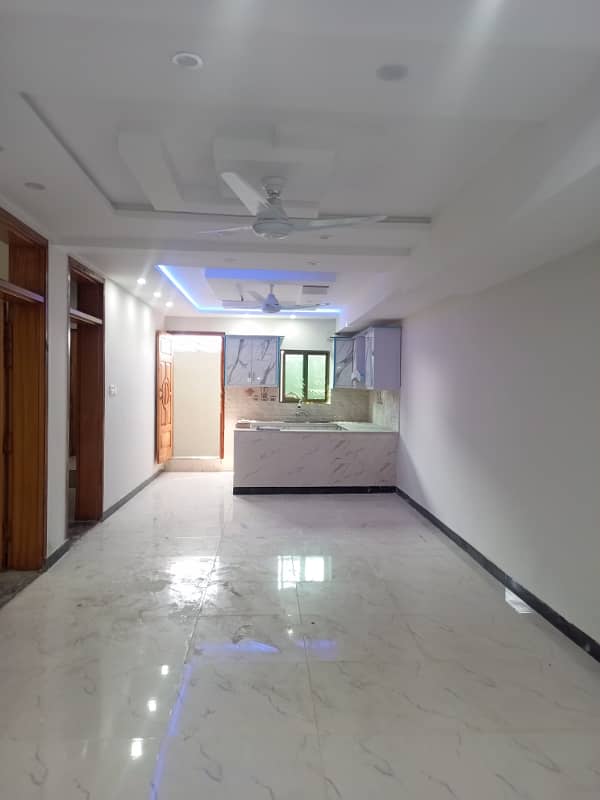 Upper portion house 1.5story available for rent location main haji cam double road. 15